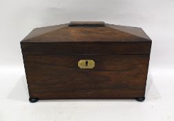 Regency rosewood sarcophagus shaped tea caddy, the interior containing two tea containers and a