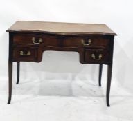 Early 20th century mahogany serpentine-fronted dressing table with four assorted drawers, 107cm