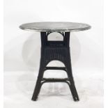 Circular top occasional table with moulded edge, basket weave panels below on four splayed legs,