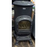 Thurcroft cast iron bottle gas operated stove, 69cm high approx