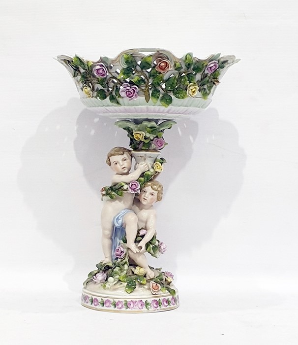 German porcelain centrepiece by Schierholz Plaue, the base and stem modelled with children amid