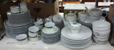 Tienshan part dinner service, cream mottled with blue and yellow geometric design, including