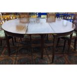 19th century Regency mahogany extending dining table raised upon square section tapering supports,