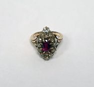 Diamond and ruby marquise ring set centre oval facet-cut ruby having surround of 14 variously