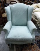 Modern duck-egg blue ground foliate patterned wingback armchair