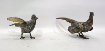 Pair of parcel gilt silver pheasant table ornaments with import marks for London 1992, the two