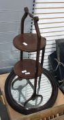 Mahogany cakestand and an oval wood carved framed mirror (2)