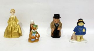 Porcelain figures to include Coalport 'Paddington' and 'Basil at Bedtime', Royal Doulton character