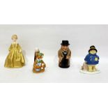 Porcelain figures to include Coalport 'Paddington' and 'Basil at Bedtime', Royal Doulton character