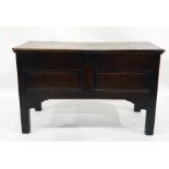 18th century oak chest with rectangular top above panelled front, raised upon rectangular