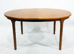 Teak extending dining table and six chairs by McIntosh