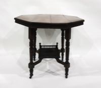 19th century octagonal centre table on turned supports with galleried undertier