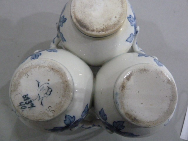 Delft fuddling cup with three beakers, of baluster form with interlocking handles, underglaze blue - Image 5 of 6