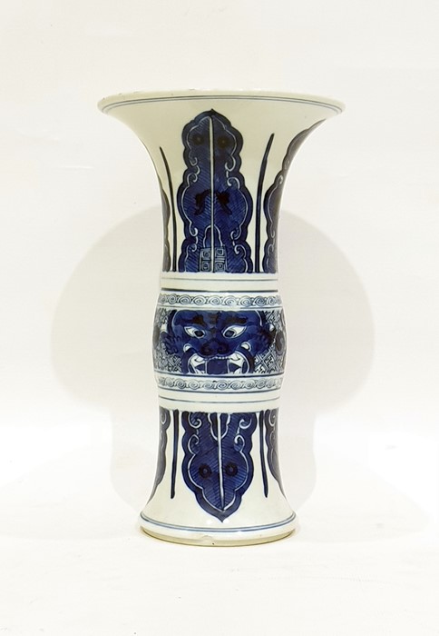 Late 19th/early 20th century Chinese vase of gu form, wide flared rim, the body decorated in blues