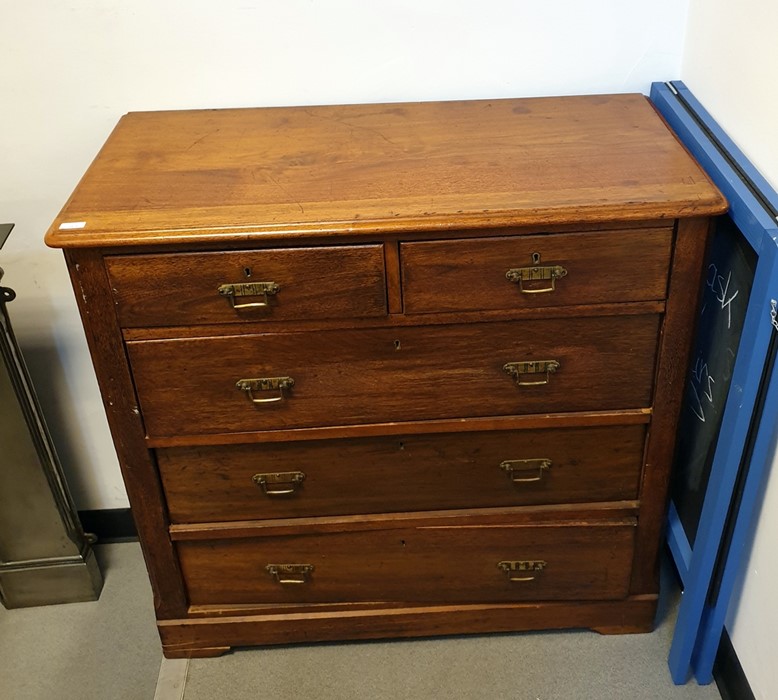 Early 20th century mahogany chest, the moulded edge above two short over three long drawers, to
