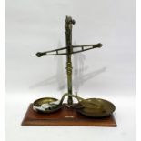 Pair of brass and mahogany mounted scales bearing ivorine plaque 'May Robert & Co Ltd, 7, 9 & 11,