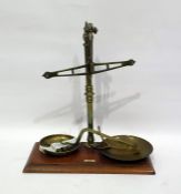 Pair of brass and mahogany mounted scales bearing ivorine plaque 'May Robert & Co Ltd, 7, 9 & 11,