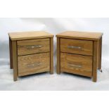 Pair of 20th century oak bedside chests of two drawers (2)