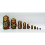 Russian Matryoskha doll in ten-tiers, each handpainted with different scenes, the largest signed '
