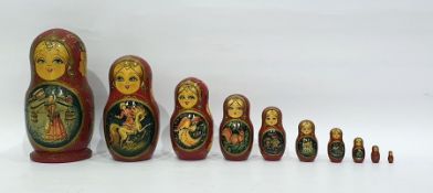 Russian Matryoskha doll in ten-tiers, each handpainted with different scenes, the largest signed '