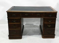 Early 20th century oak pedestal desk with moulded edge, above nine assorted drawers, to plinth base,