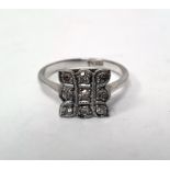 Platinum and diamond pave set ring, shaped square, with three rows of three each small diamonds,