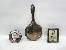 Silver backed hand mirror, a silver photograph frame of rectangular form, 10cm x 7cm and a silver