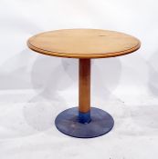 Pair of circular top maple wood occasional tables on steel supports