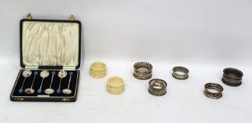 Pair of silver napkin rings by Walker & Hall, Sheffield 1902, with engraved foliate decoration,