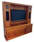 Modern solid cherrywood custom-made unit, (holding a Panasonic flatscreen television, the screen