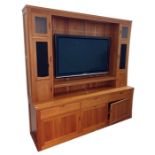 Modern solid cherrywood custom-made unit, (holding a Panasonic flatscreen television, the screen