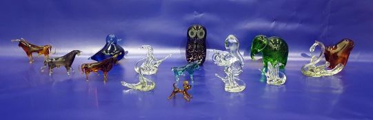 Quantity of decorative glassware to include mottled style model of owl, elephant and further animals