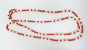 Cultured pearl and coral bead necklace set trios of pearls alternating with smaller coral beads,