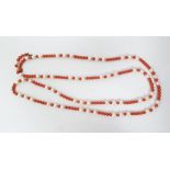 Cultured pearl and coral bead necklace set trios of pearls alternating with smaller coral beads,