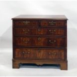 Early 19th century and later walnut and inlaid chest of drawers, the rectangular top with applied