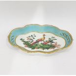 Porcelain spoon tray, shaped oval and painted with exotic birds to centre, having turquoise and