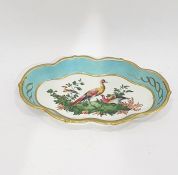 Porcelain spoon tray, shaped oval and painted with exotic birds to centre, having turquoise and