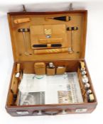 S Fisher Ltd of London brown leather fitted travel dressing case, the lid emblazoned with the