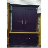 20th century John Lewis of Hungerford kitchen cabinet finished in aubergine, the two doors enclosing