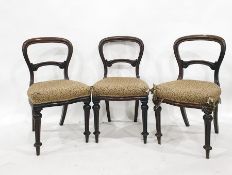 Set of eight Victorian mahogany balloonback dining chairs, serpentine fronted, overstuffed seats,