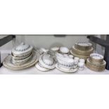 Minton table service for eight covers in the 'Ermine' pattern, comprising plates of three sizes,