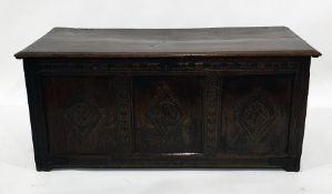 18th century oak coffer with three diamond carved panels to the front, on cut-down stile supports,