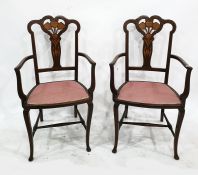 Pair of inlaid Edwardian open armchairs, the back splat and top rail inlaid with flowerheads, in the