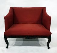 Early 20th century mahogany-framed red upholstered settee with shell carving to the apron, raised on