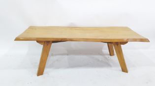 Low plank-top rectangular coffee table raised upon four supports, 28cm x 40cm