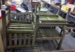 Wooden garden slatted garden bench with one matching chair and two small garden tables. The bench is