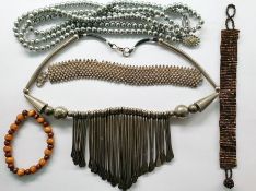 Quantity of costume jewellery including strings of faux-pearls, hardstone necklaces and gilt chains