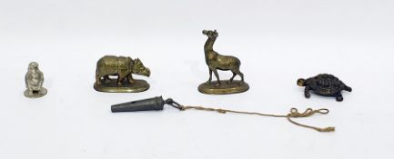 Small brass model giraffe, brass model tortoise and rhinoceros, plated model bird and an old metal