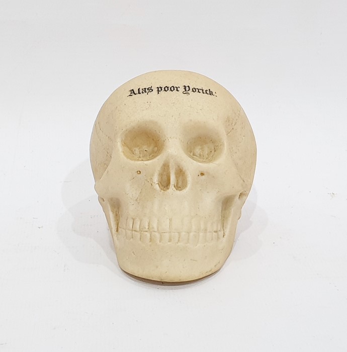 Porcelain model of a skull by W H Goss, of realistic colouring, inscribed 'Alas Poor Yorick', 8cm