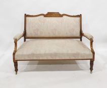 19th century rosewood-framed open arm settee with